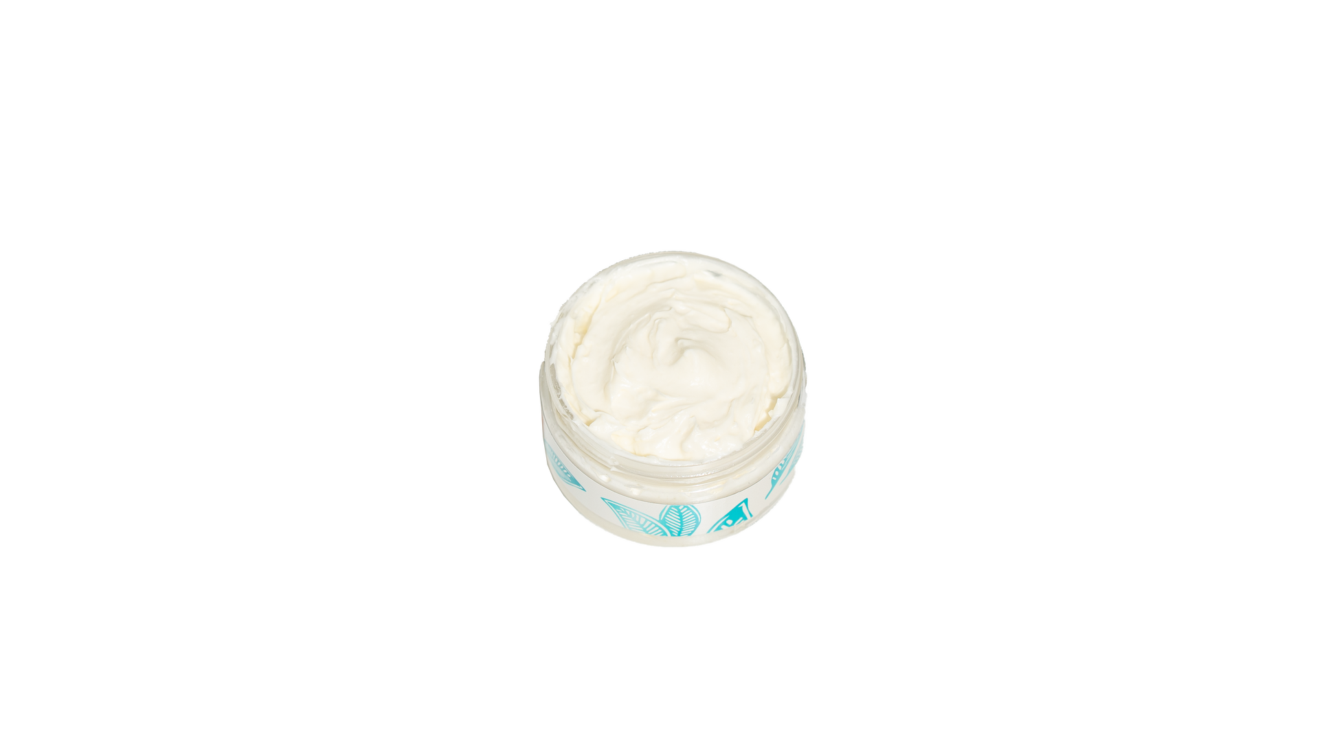  An open 4 oz. jar of Vanilla Chamomile body butter is visible from above against a transparent background, revealing its smooth, creamy texture.